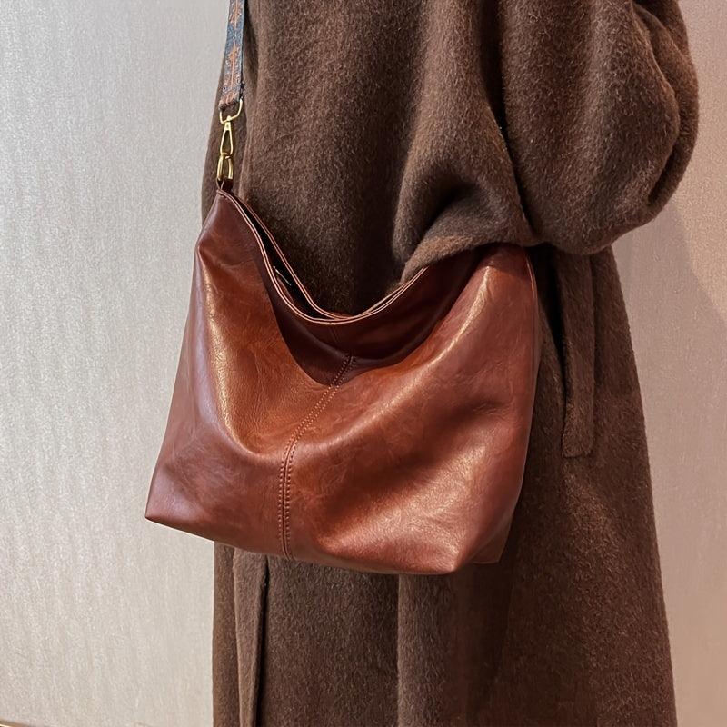 Clara - Didelės talpos elegantiška peties rankinė